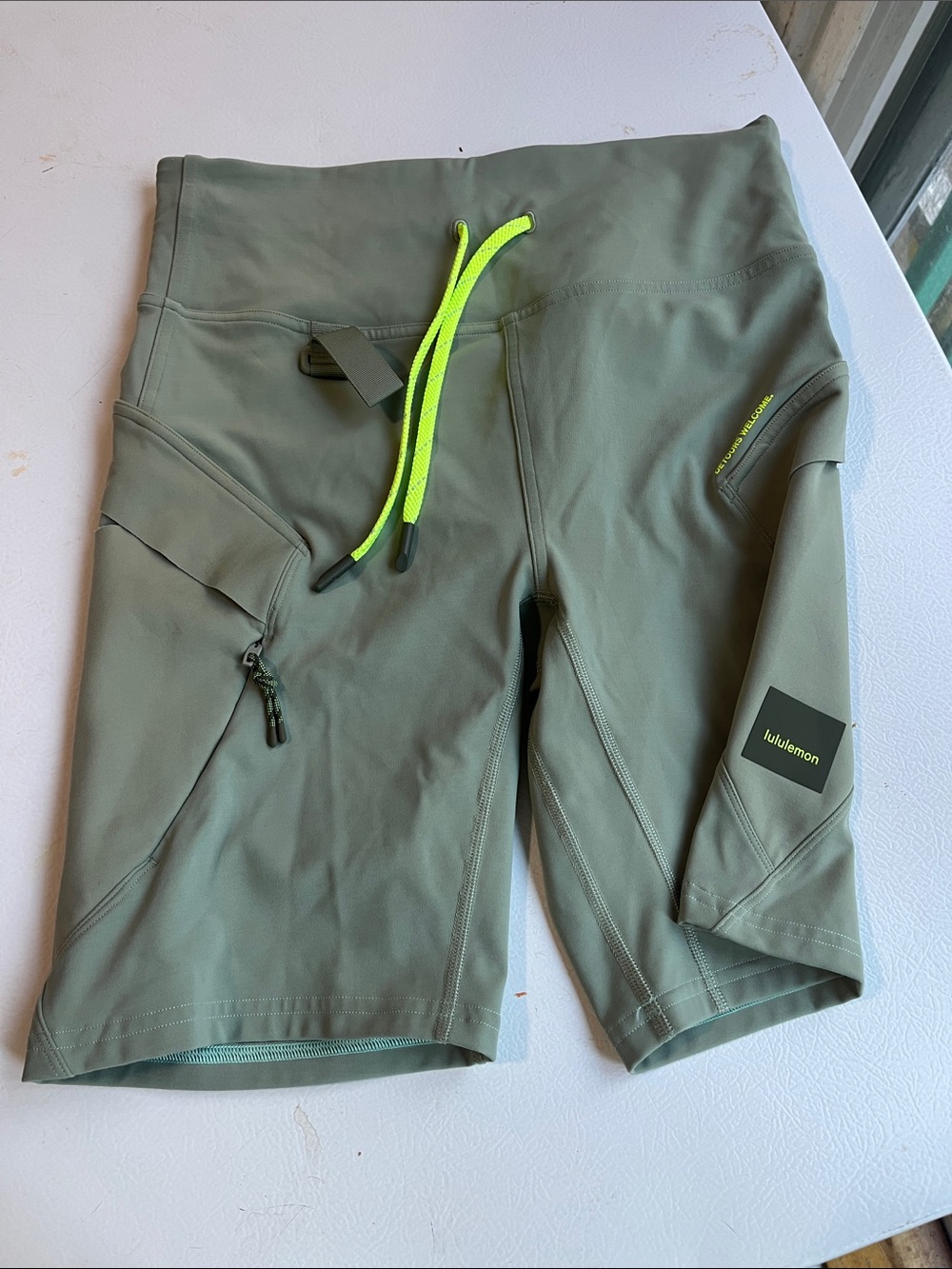 lululemon athletica Womens Olive Green Athletic Shorts with Neon Yellow Drawcord